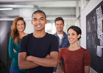 Image showing Their combined minds create a great team. Cropped portrait of a team of young creative professionals standing in the office.