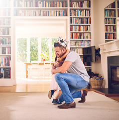 Image showing Daddy loves you with his whole heart. Shot of a father hugging his little daughter at home.