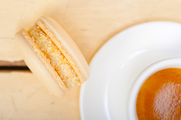 Image showing colorful macaroons with espresso coffee