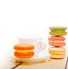 Image showing colorful macaroons with espresso coffee