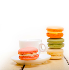 Image showing colorful macaroons with espresso coffee