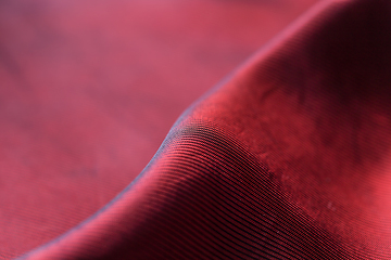 Image showing Closeup of red satin fabric