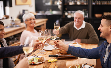 Image showing Friends and family are the true gifts in life. Shot of a family sitting down to dinner.