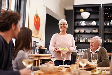 Image showing Friends and family are the true gifts in life. Shot of a family sitting down to dinner.