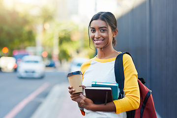 Image showing Ive got my books and coffee, Im ready for college. Cropped shot of a young female student commuting to college in the city.