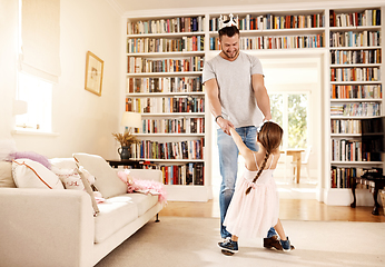 Image showing Can I have this dance with you. Shot of a father dancing with his little daughter at home.