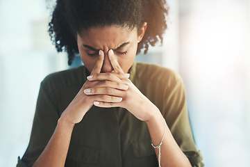 Image showing Some days evidently bring no solutions to your problems. Shot of a young businesswoman looking overly stressed in her office.