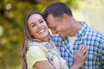 Image showing Sharing loving moments outdoors. Portrait of an affectionate couple outside in the summer sun.