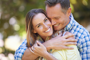 Image showing They love spending time outdoors. Shot of an affectionate couple enjoying the summer sun.