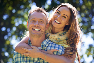 Image showing Were so in love. Portrait of an affectionate couple outside in the summer sun.