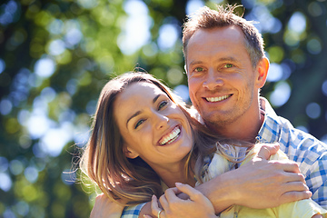 Image showing Showing their love. Portrait of an affectionate couple outside in the summer sun.