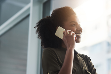 Image showing New ideas and trends shared prompt and easily. Close up shot of a young businesswoman making a phone call in her office.