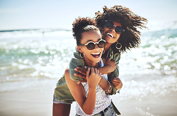 Image showing We missed the beach. Shot of two girlfriends enjoying themselves at the beach.