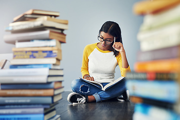 Image showing She needs to concentrate, the finals are approaching. Shot of a young female student studying at home.