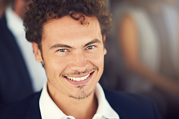 Image showing Happy to here and eager to learn. Portrait of a handsome young businessman attending a seminar.