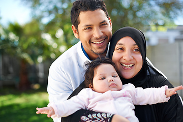 Image showing Were a blessed family. Portrait of a muslim family enjoying a day outside.