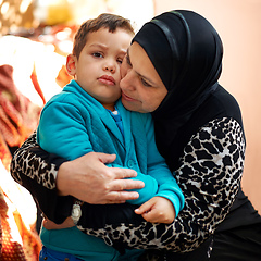 Image showing Whos grandmas little boy. Shot of a grandmother hugging her grandson.