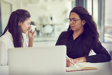 Image showing I couldnt hold it in anymore. Cropped shot of a businesswoman sneezing in her colleagues face in an office.