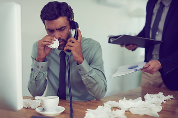 Image showing He could do with a time-out from work. Cropped shot of a businessman suffering with allergies in an office.