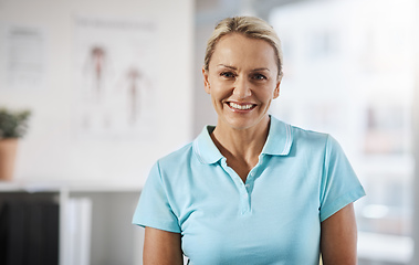 Image showing Im here to help you heal. Cropped portrait of a mature female physiotherapist working in her office.