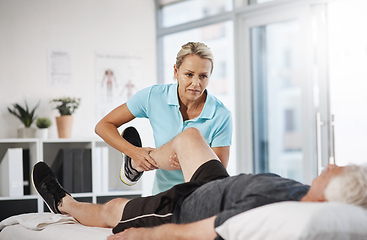 Image showing Lets test out your mobility. Cropped shot of a mature female physiotherapist working with a senior male patient in her office.