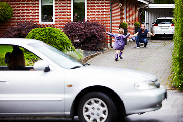 Image showing Shes happy to be home. Shot of a little girl running towards her father.