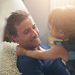 Image showing Daddy loves you so much. Shot of a single dad hugging his daughter at home.