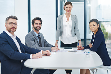 Image showing Well have it sorted in no time. Portrait of a group of corporate businesspeople meeting in the boardroom.