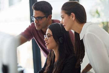 Image showing They play a large role in the customers experience. Shot of colleagues working together in an office.