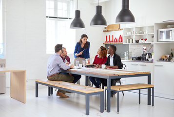 Image showing Listen up. Full length shot of a group of businesspeople in a meeting.