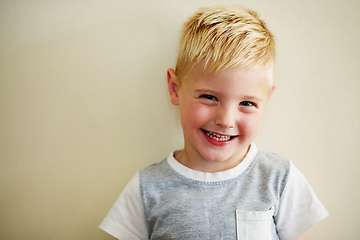 Image showing Tell me again how cute you think I am. Portrait of an adorable little boy at home.