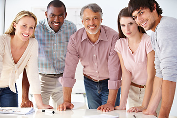 Image showing It takes all kinds to make a business work. Shot of a diverse group of colleagues in the office.