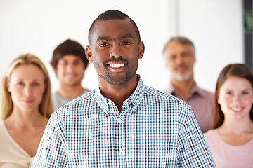 Image showing It takes all kinds to make a business work. Shot of a diverse group of colleagues in the office.