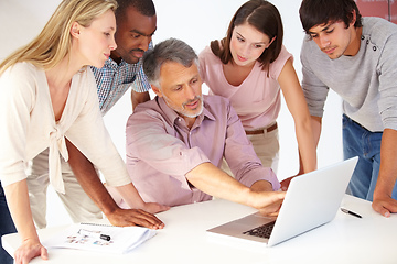 Image showing It takes all kinds to make a business work. Shot of a diverse group of colleagues in the office.