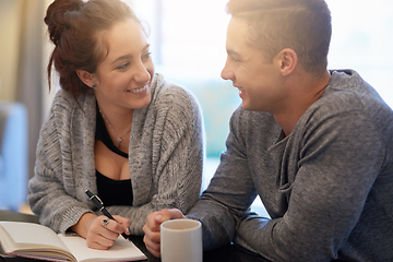 Image showing You are my inspiration. Shot of a happy young couple relaxing at home.