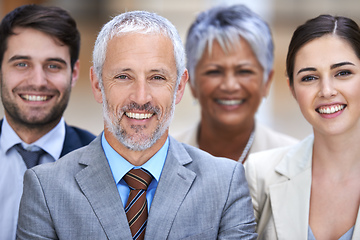 Image showing We stand by our word. Shot of a group of confident businesspeople.