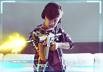 Image showing Call of duty. Shot of a young boy playing violent video games.