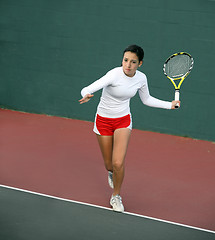 Image showing Girl playing tennis