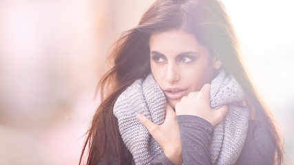 Image showing Staying classy in the cold. Cropped shot of a beautiful young woman wearing stylish winter clothing.