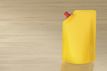 Image showing Yellow stand-up pouch with spout