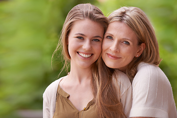 Image showing Theyve always been very close. Portrait of a mother embracing her daughter.