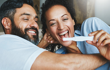 Image showing Were going to be parents. Shot of a happy couple celebrating their new pregnancy at home together.