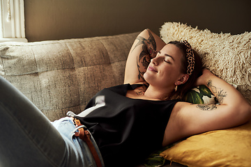 Image showing This is why weekends were invented. Shot of a young woman relaxing on the sofa at home.