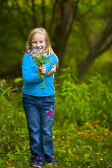 Image showing Wildflowers Presented by Girl