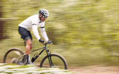 Image showing Nature mockup, bicycle or sports man travel, ride and journey on freedom adventure, extreme triathlon race or cycling. Mountain bike, forest speed blur and athlete training for competition in woods