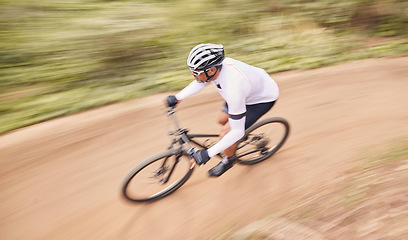 Image showing Nature path, mountain bike and sports man travel, ride and adventure on off road trail, outdoor challenge or cycling. Top view bicycle, speed blur and athlete training, fitness and cardio in forest