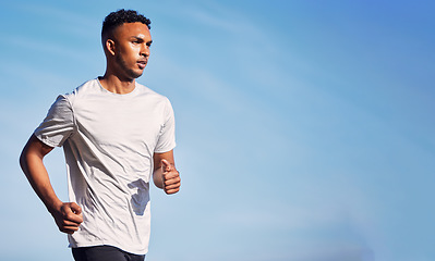 Image showing Running, man and training in summer nature and outdoor exercise with athlete in healthy workout or mockup of fitness. Male, runner and motivation in morning cardio, sports or health goals on blue sky