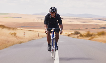 Image showing Portrait, street and man on a bike for travel, countryside cycling or training for a competition. Serious, fitness and a male cyclist with a bicycle in the road for a race, adventure or nature cardio