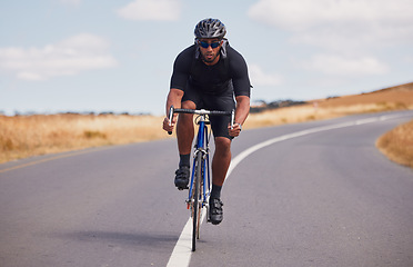 Image showing Portrait, street and man on a bike for fitness, countryside cycling or training for a competition. Serious, sport and a male cyclist with a bicycle in the road for a race, adventure or nature cardio