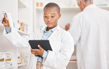 Image showing Inventory, pharmacy and black woman with a tablet, connection and research on medication or pill box for treatment. Healthcare, pharmaceutical and African person with technology or check prescription